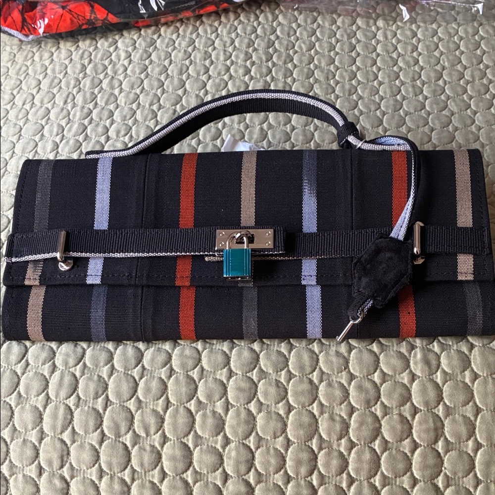 African print aso oke bag, lined with black velvet. Wearable in multiple ways!